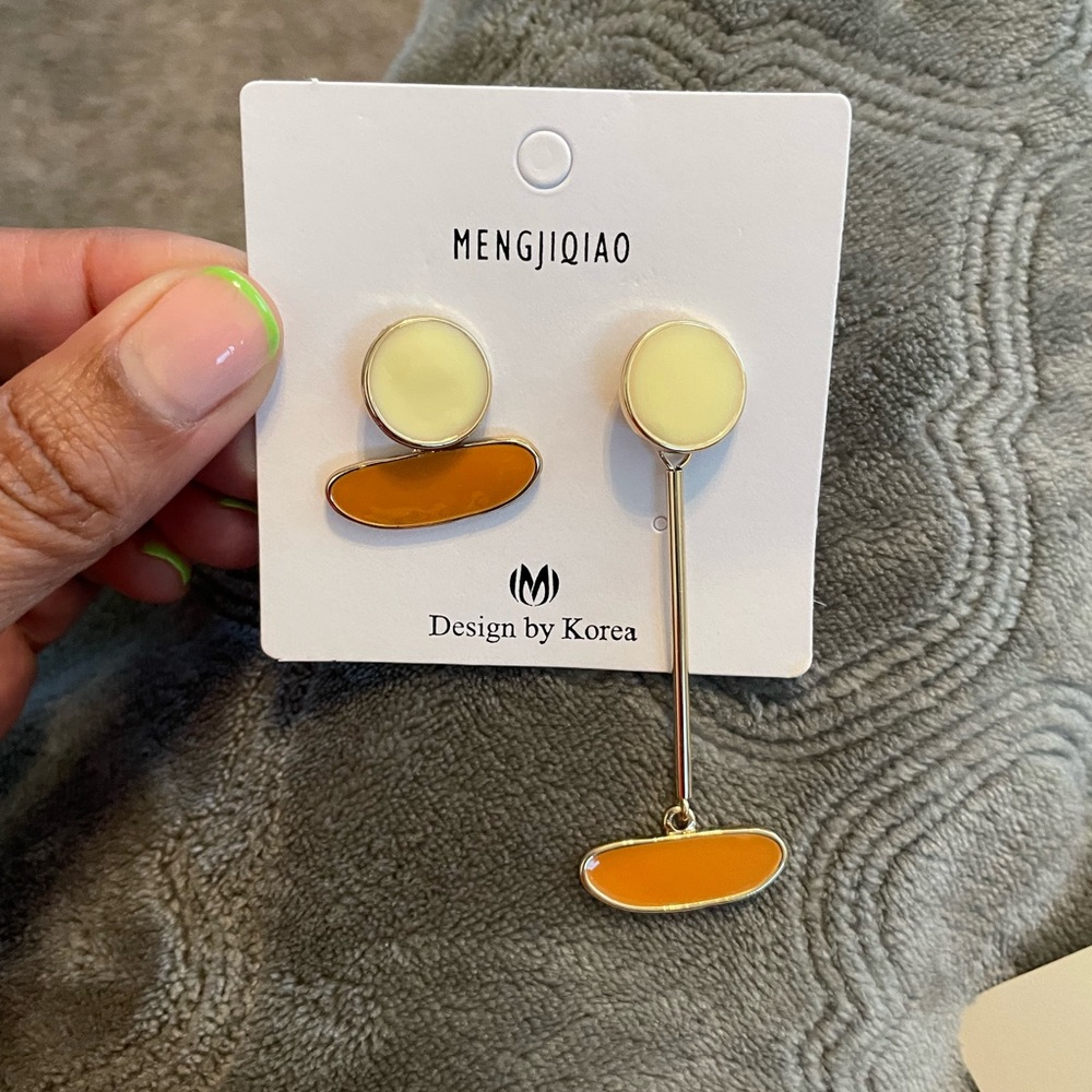 asymmetrical earrings
